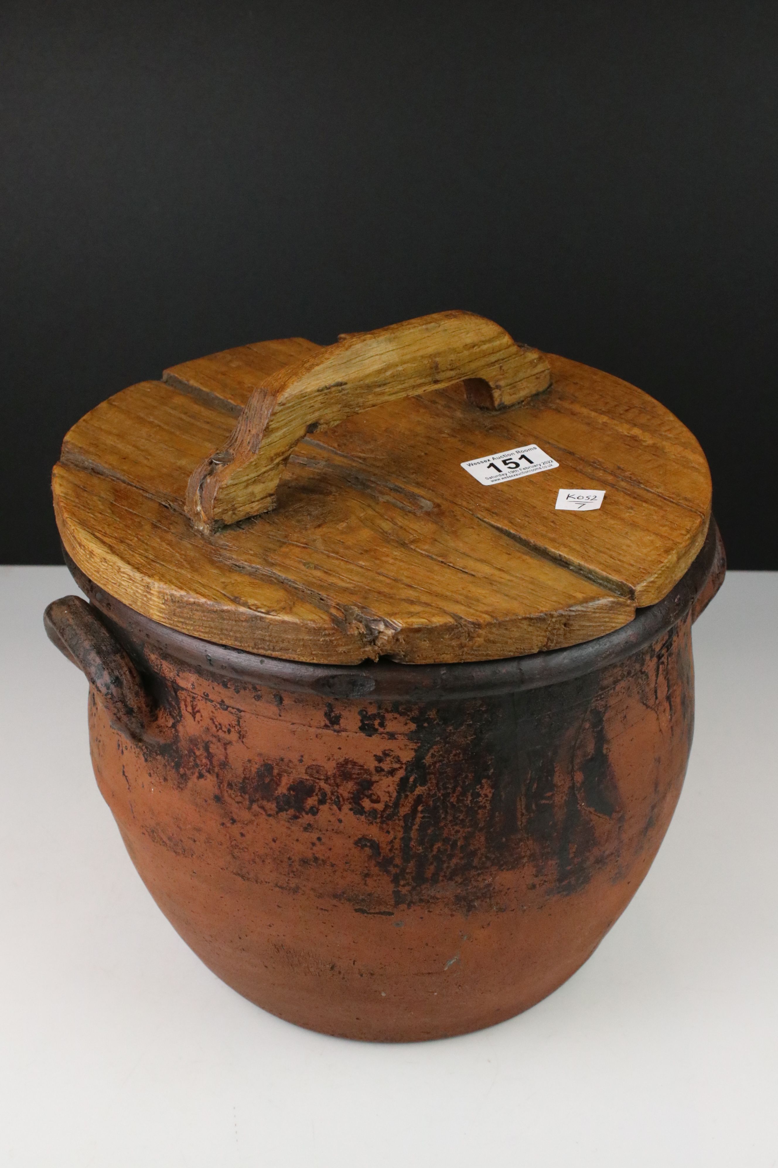 Vintage terracotta flour bin with wooden lid