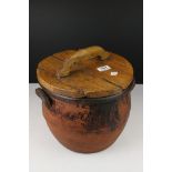 Vintage terracotta flour bin with wooden lid