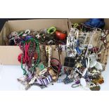 A large collection of vintage and contemporary costume jewellery contained within two boxes.