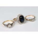 A collection of three ladies gold rings to include two 18ct gold and a 9ct gold example.