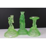 Three Art Deco Green Glass Candlesticks, two moulded in the form of semi-naked ladies and the