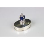 Silver oval pill box with crown pincushion to the lid