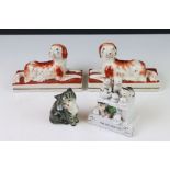 Small Beswick cat figure together with Two Staffordshire style dogs and another figure