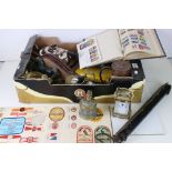 A box of mixed collectables to include an inkwell with cherub decoration, bellows, postal scales,