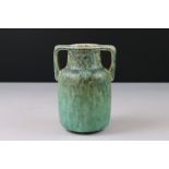Ruskin Twin Handled Vase with green mottled finish, impressed Ruskin mark and 1933, 16cms high