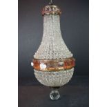 An antique ceiling light with faceted decoration.