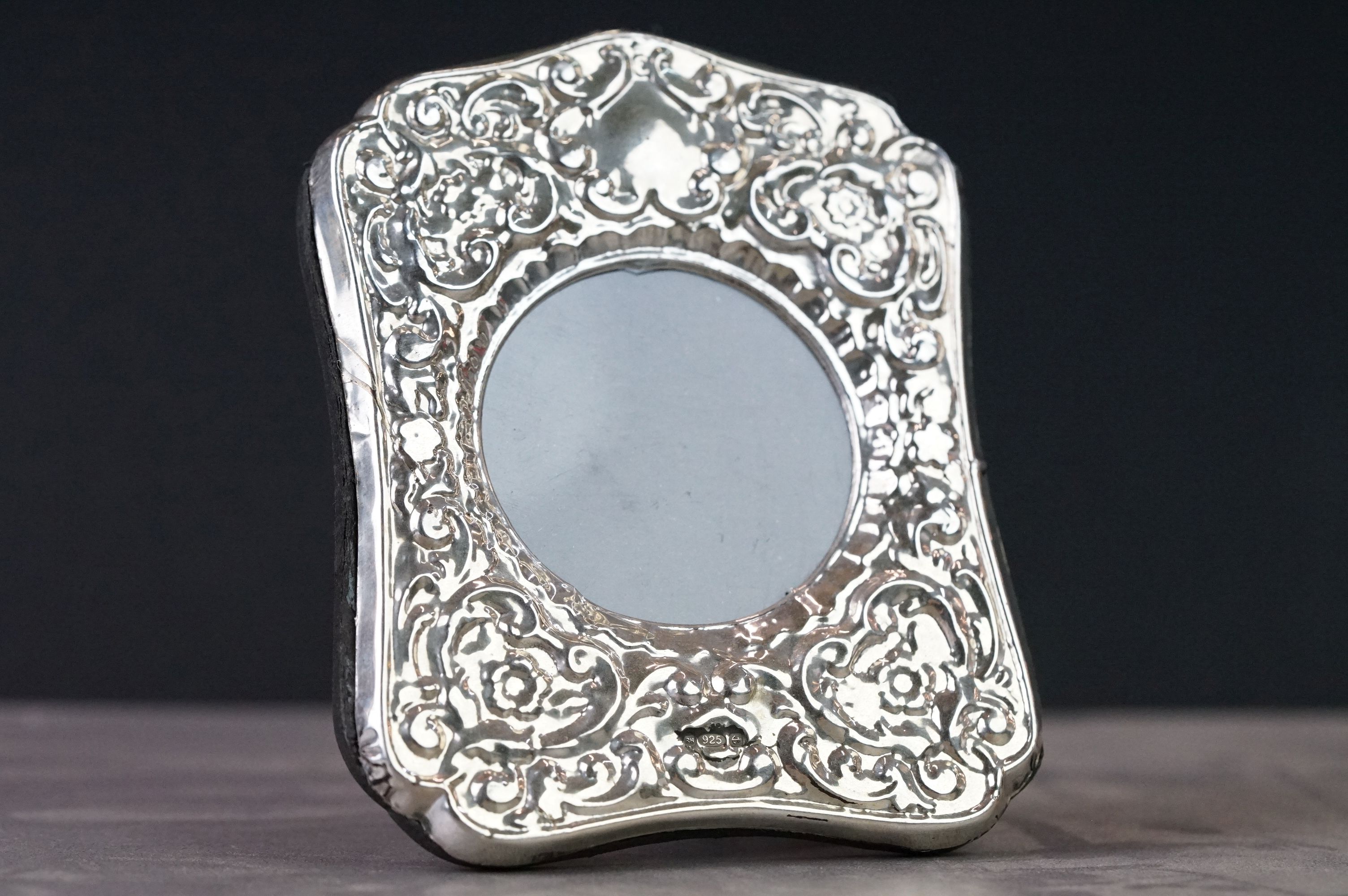 Silver easel back picture frame with embossed decoration