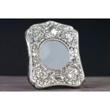 Silver easel back picture frame with embossed decoration