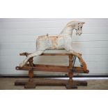 19th century style Wooden Rocking Horse held on a Trestle Base, 111cms long x 100cm high