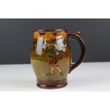 Royal Doulton Kingsware ' Golfing ' Tankard decorated with Crombie Golfers, 14cm high