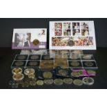 A collection of coin to include Commemorative Crowns, first day coin covers and a 1937 silver crown.