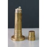 Brass table lighter in the form of a lighthouse with wren farthing decoration