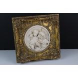 Faux Marble Classical Relief Plaque depicting Madonna and Child contained within a Gilt Frame,