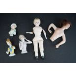 A collection of five antique ceramic pin dolls.