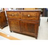 19th century Mahogany and featherbanded Secretaire Cabinet, the top drawer with fall front opening