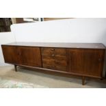 Wolfe & Hollander - Scandart Ltd of High Wycombe - Dark Elm and Teak Sideboard having a bank of four