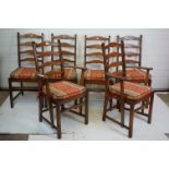 Set of six Ercol ladder back dining chairs, to include two carvers