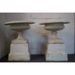 Pair of White Finished Cast Metal Garden Urns on Plinths, 39cm diameter x 47cm high