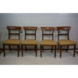 Set of Four William IV Mahogany Dining Chairs with stuff over seats and raised on octagonal tapering