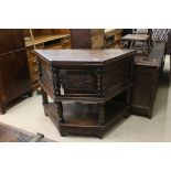 Carved Oak Cupboard of trapezoid form in the 17th century manner with single door and shelf below,