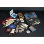 A box of mixed collectables to include coins, badges, cut throat razors and a draughtsman's set.