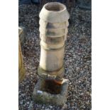 Small Stone Garden Trough, 32cm x 30cm x 15cm high together with Clay Chimney Pot, 76cm high