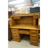 Reproduction Victorian style Light Oak Roll Top Desk, the drop down tambour front opening to a