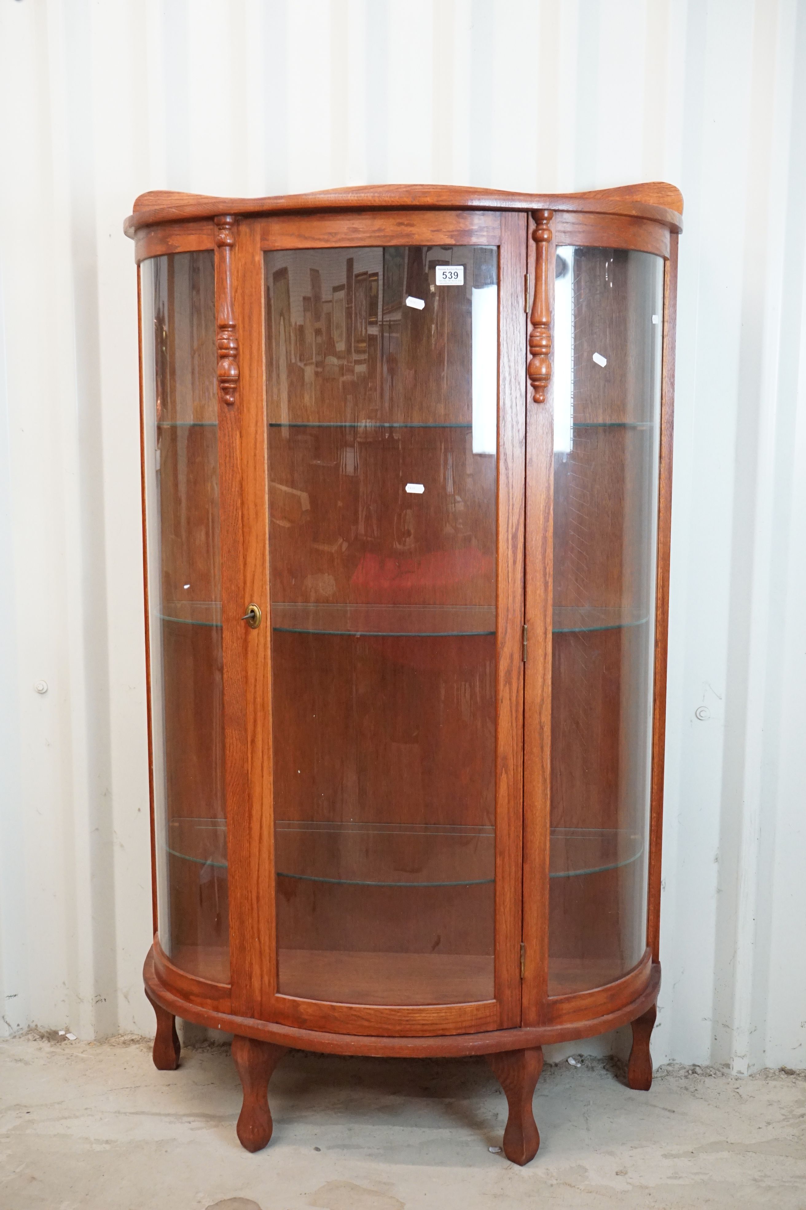 Early to Mid 20th century Oak Demi-lune Display Cabinet, the single door opening to three adjustable