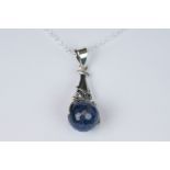 Silver pendant necklace with lapis lazuli revolving ball