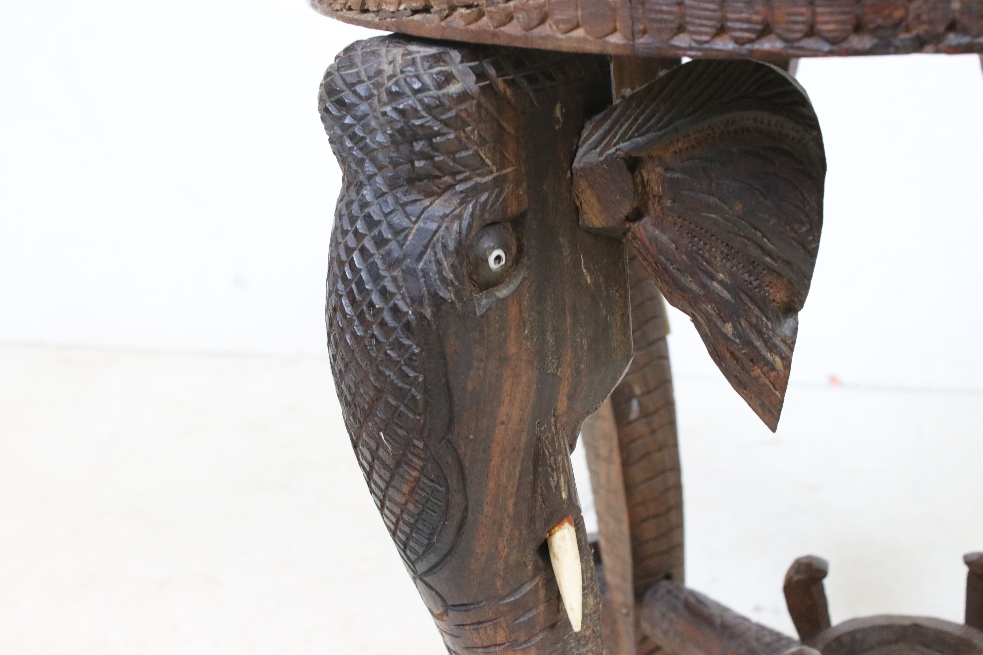 Indian Hardwood Circular Table with bone inlay, the four legs carved in the form of Elephant Heads - Image 2 of 5