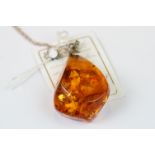 Large amber necklace with silver mounts