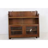 Late 19th / Early 20th century Gothic Mahogany Hanging Cabinet with two shelves over two glazed