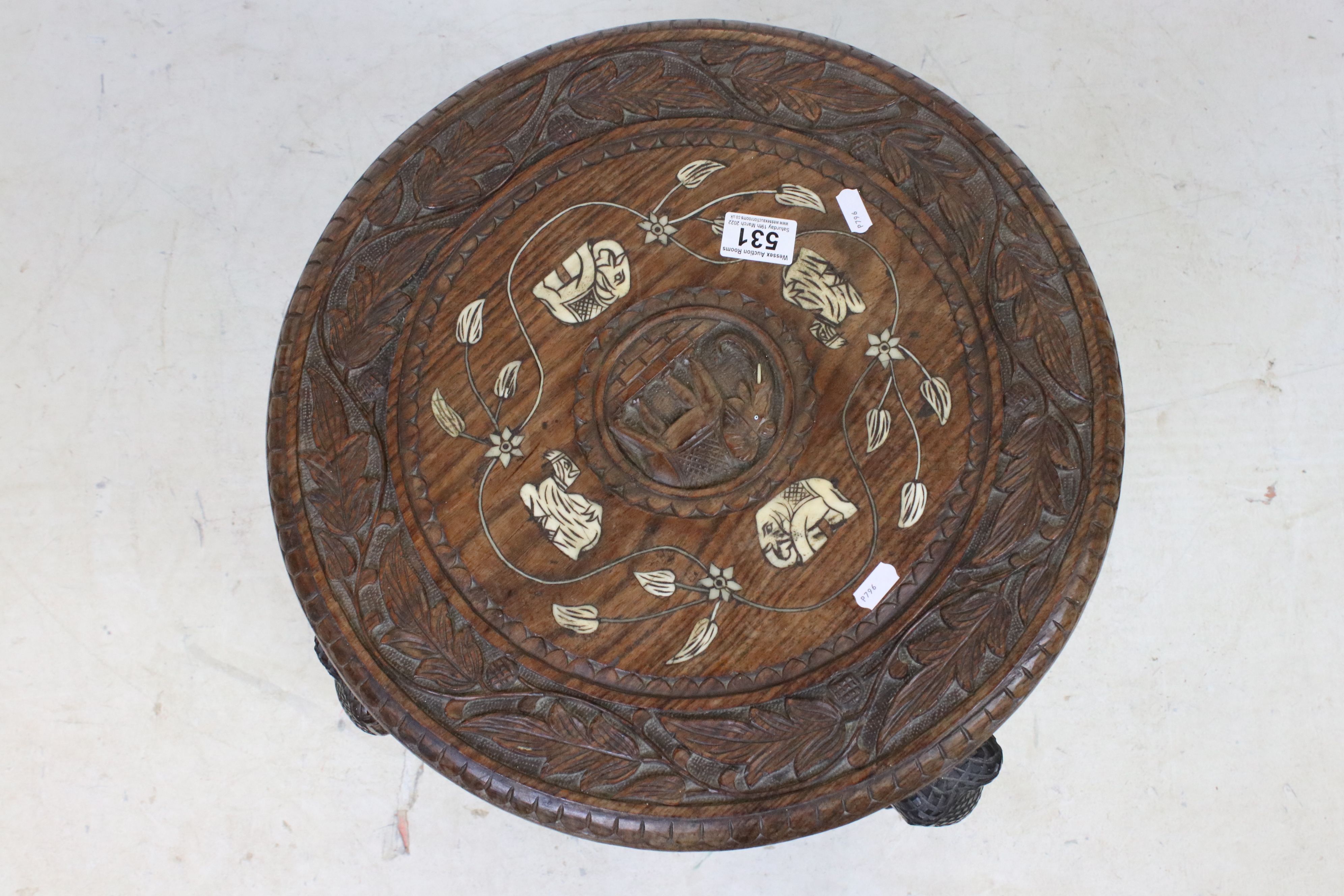 Indian Hardwood Circular Table with bone inlay, the four legs carved in the form of Elephant Heads - Image 5 of 5