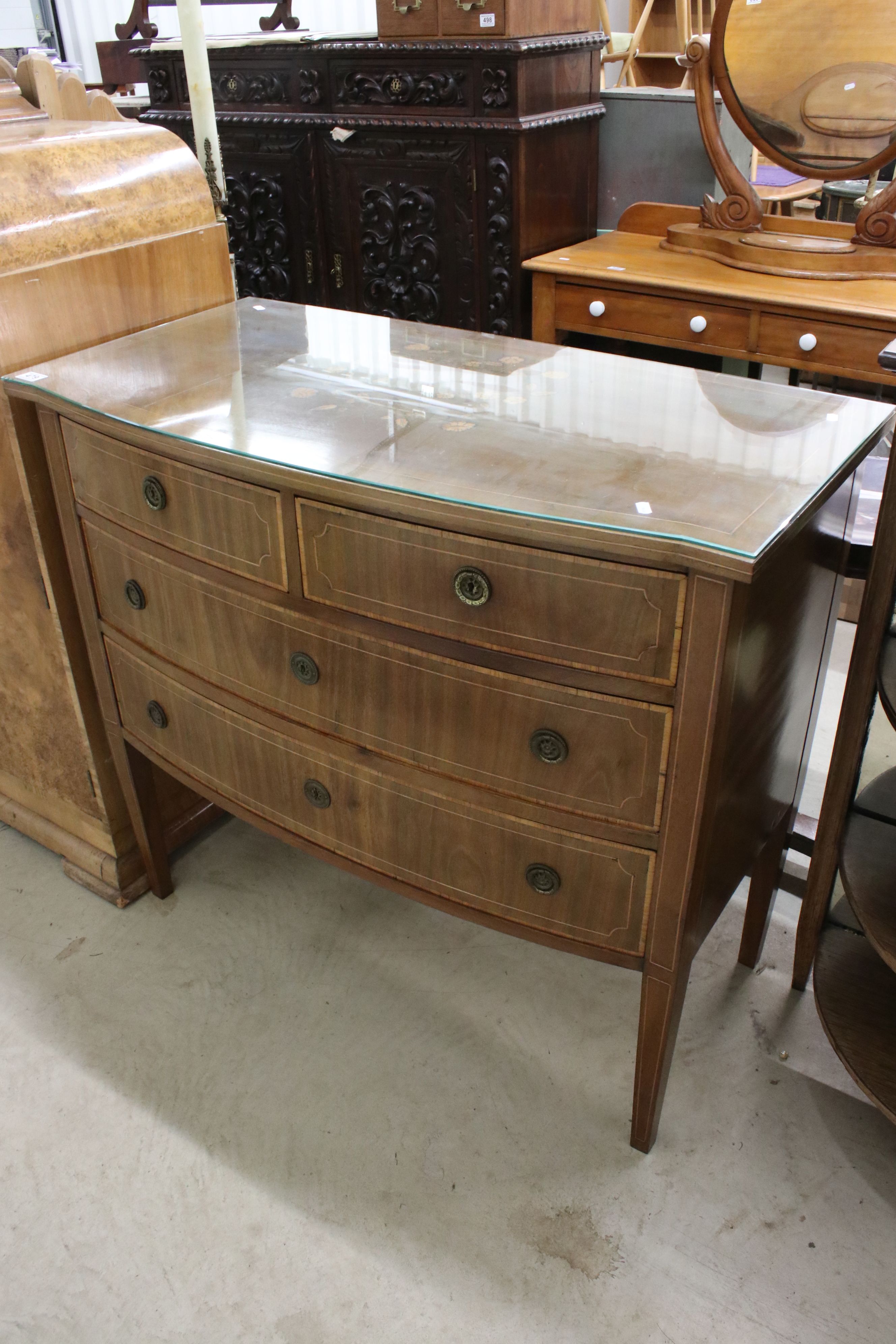 Edwardian Mahogany Bow Fronted Chest of Two Short over Two Long Drawers with foliate inlay to top,