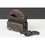 An antique screw type padlock complete with screw key.
