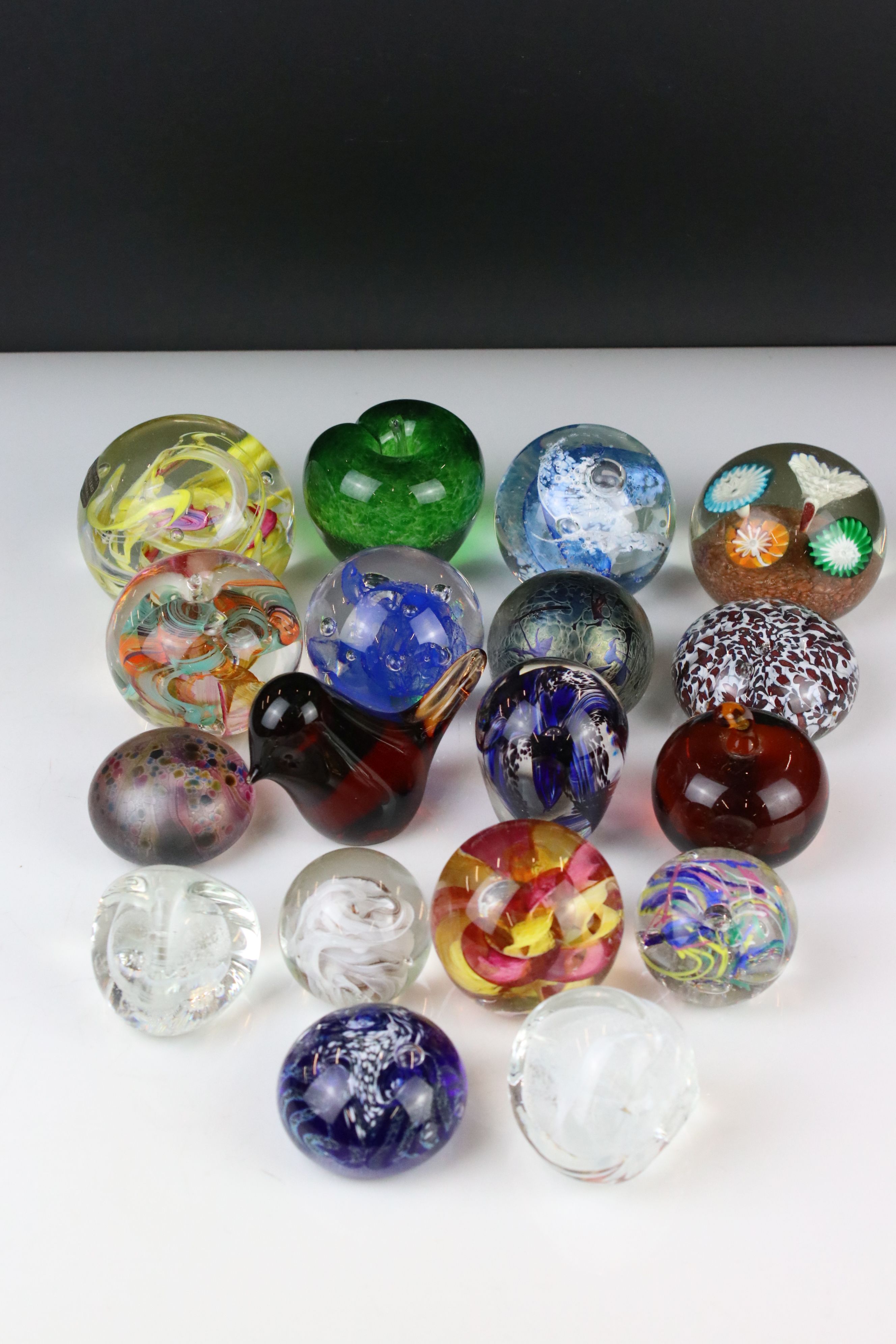 Eighteen Glass Paperweights including Royal Brierley iridescent, Selkirk, Murano, Isle of Wight,