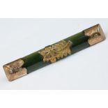 A vintage Jade bar brooch with 9ct gold mounts.