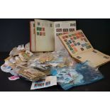 A collection of British and world stamps within albums together with loose examples.