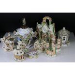 Nine Staffordshire Pastille Burners in the form of Houses and Castle, tallest 23cm together with a