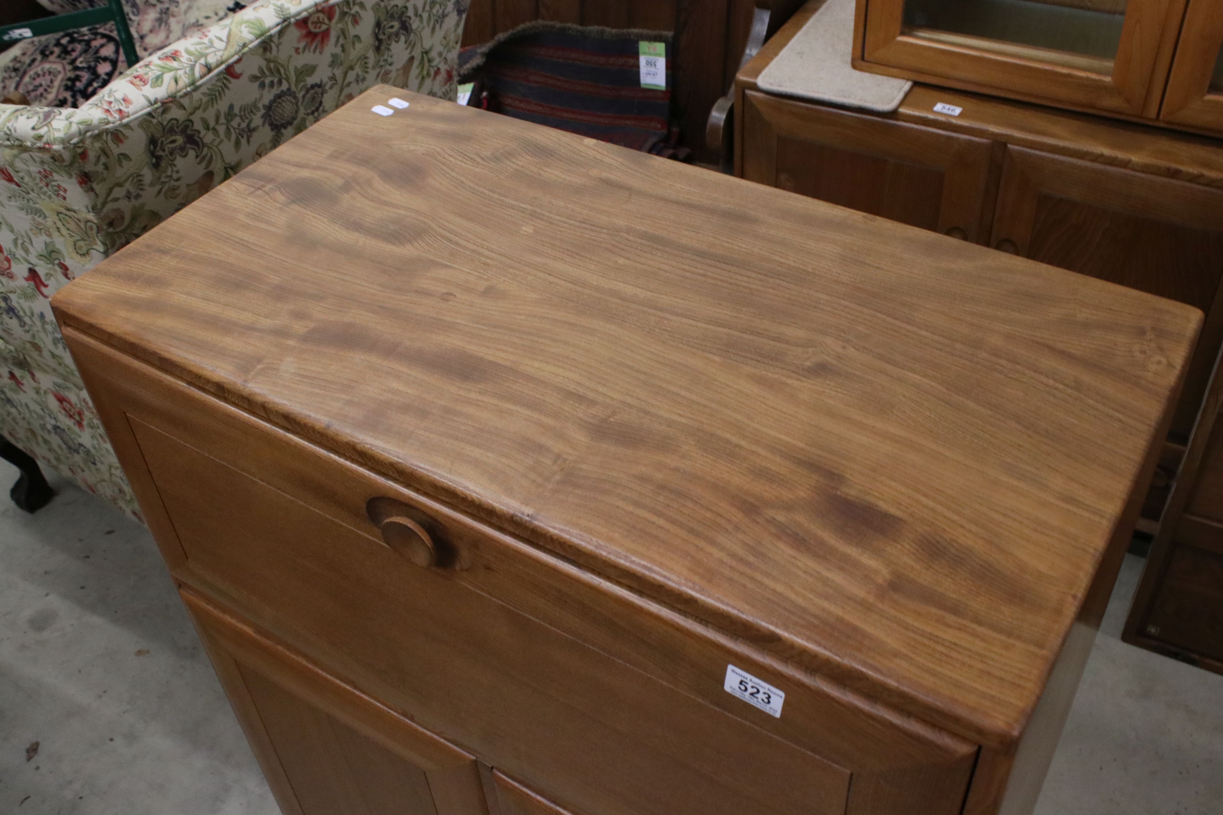 Ercol Windsor Blonde Elm Cocktail / Serving Cabinet, model 469, with fall front above two - Image 4 of 4