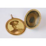 A early 20th century 9ct gold front and back locket with military photograph and lock of hair to the