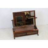 William IV Mahogany Rectangular Swing Dressing Mirror, the base with two moulded drawers, 71cm