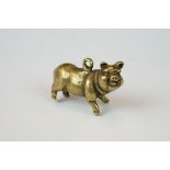 Small brass pig pendant, length approx. 3cm