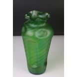 Loetz style Green Glass Vase with wavy rim and ribbed body, 27cm high