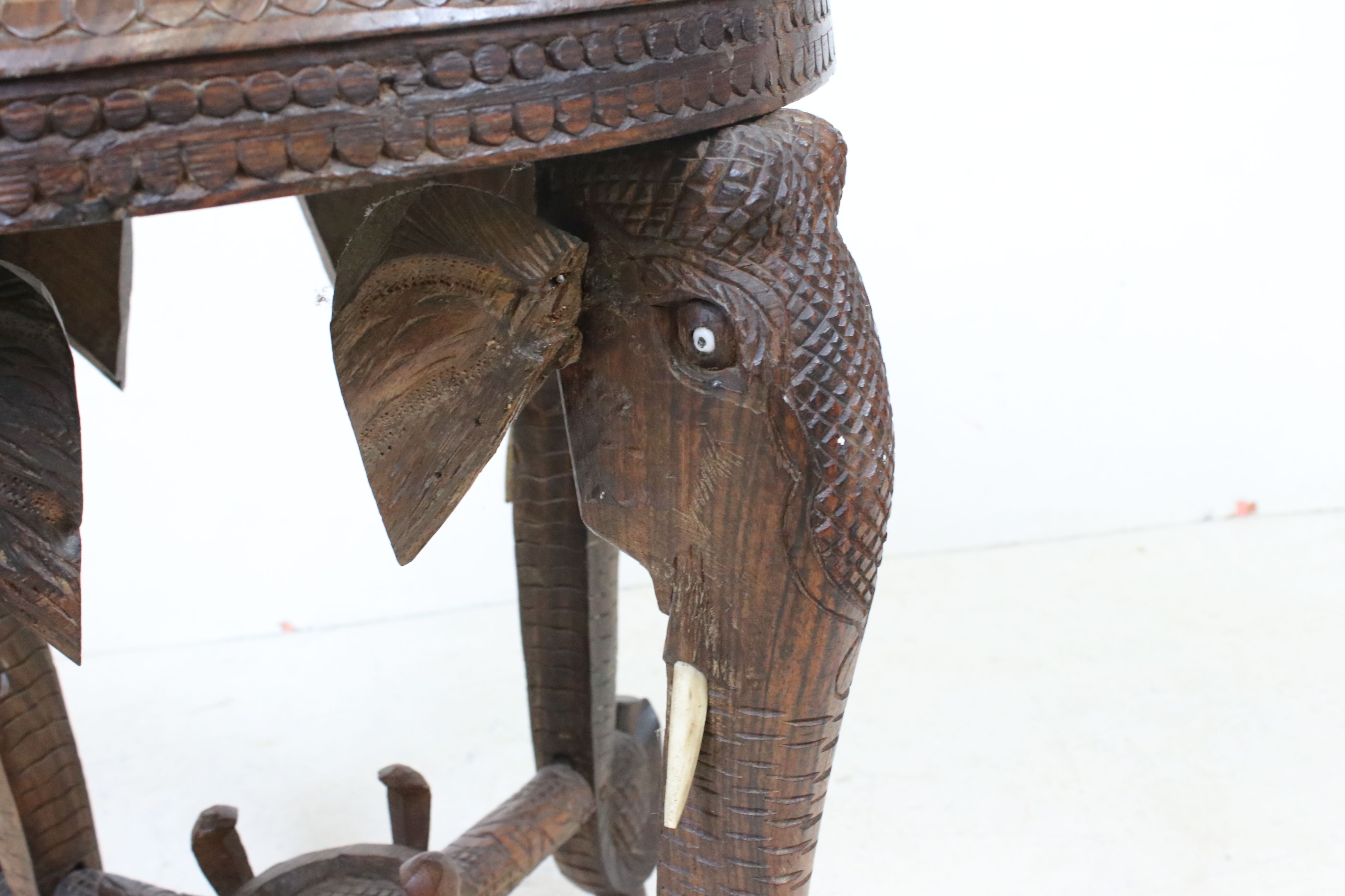 Indian Hardwood Circular Table with bone inlay, the four legs carved in the form of Elephant Heads - Image 3 of 5