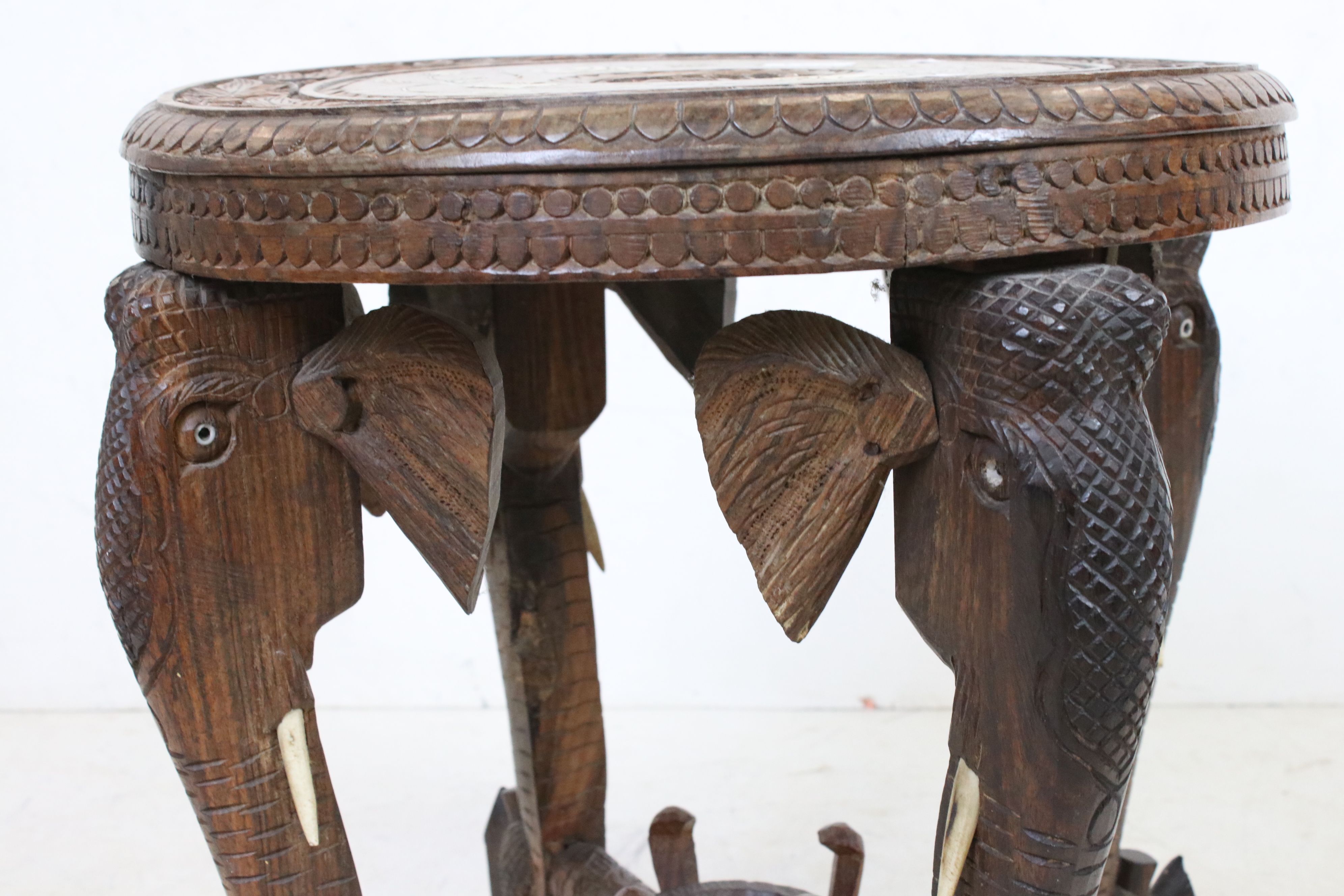 Indian Hardwood Circular Table with bone inlay, the four legs carved in the form of Elephant Heads - Image 4 of 5