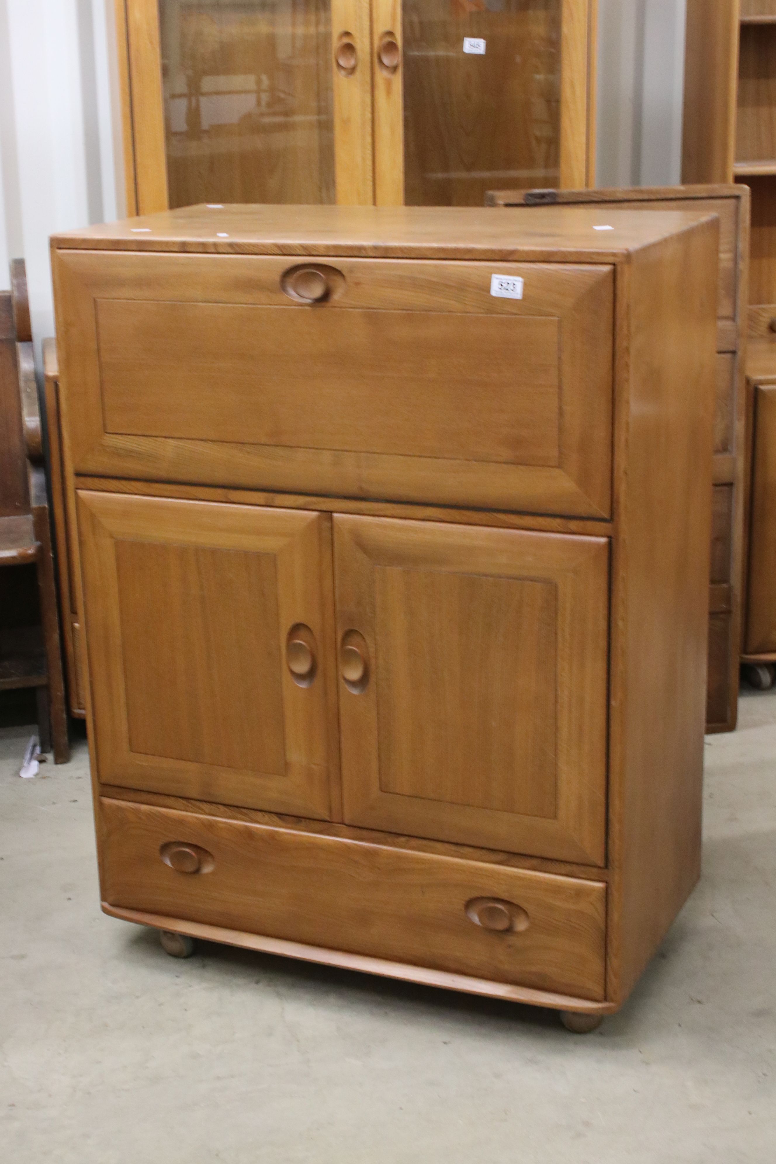 Ercol Windsor Blonde Elm Cocktail / Serving Cabinet, model 469, with fall front above two