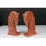 Pair of pottery bookends in the form of stylized horses