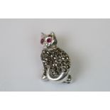 Silver cat brooch set with marcasites and ruby eyes