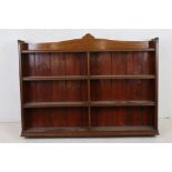Late 19th / Early 20th century Mahogany Bookcase with shaped top rail, 121cm long x 90cm high